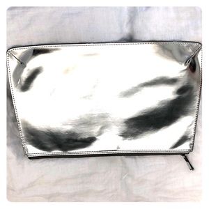 Silver leather zip clutch